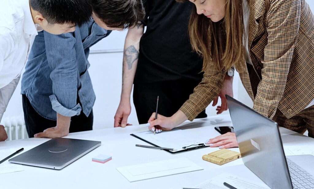 team working around desk