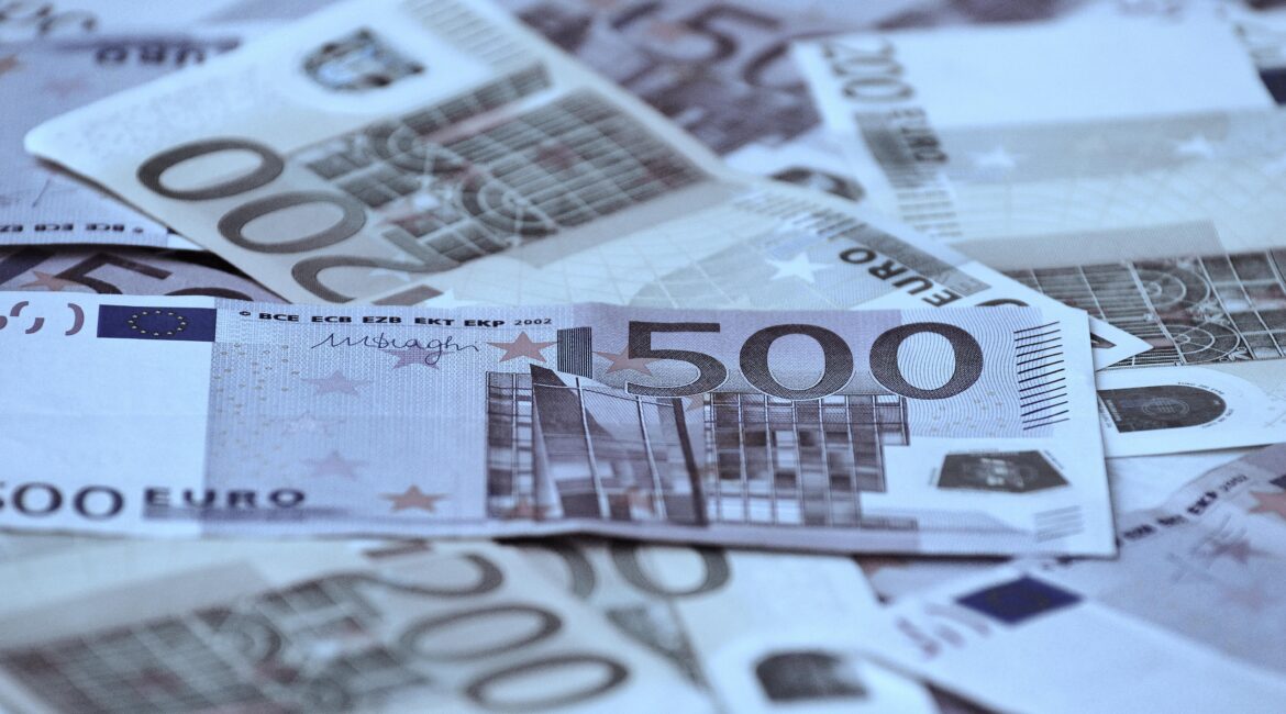 scattered 200 and 500 euro bills